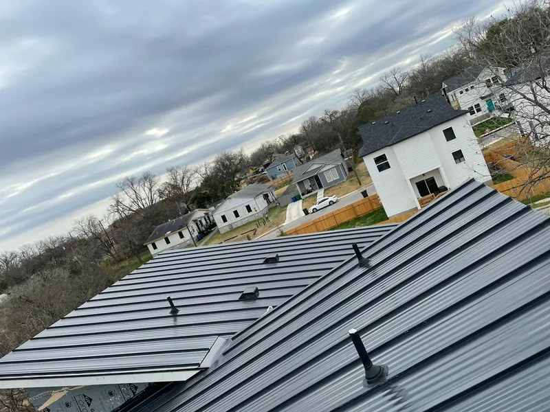 Standing seam metal roof panels with vents for Skylight Repair in Franklin